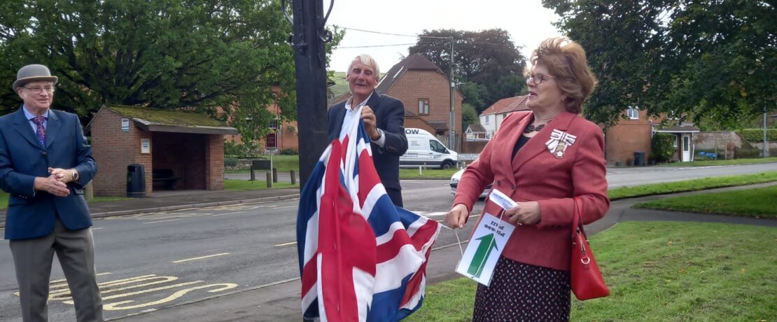 The Lord-Lieutenant of Wiltshire, Mrs Sarah Troughton, unveils the Best Kept Large Village standard at Bratton