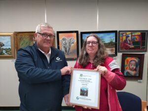 Paul Mortimer from Grist Environmental presenting Louise Topp with her prize certificate