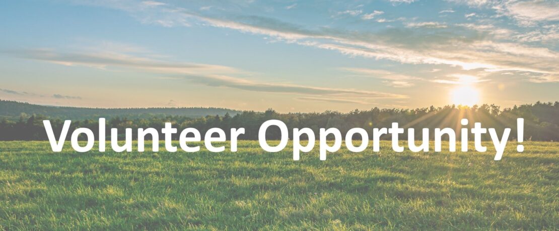 A picture of the countryside with the words 'Volunteer Opportunity' across the picture.