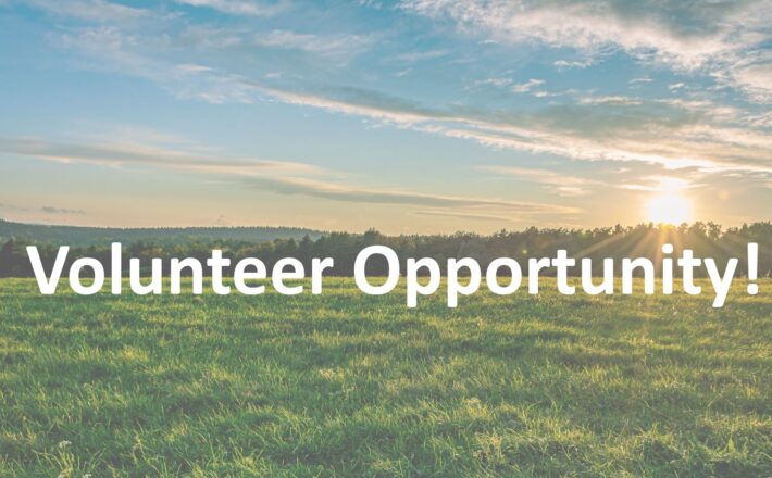 A picture of the countryside with the words 'Volunteer Opportunity' across the picture.